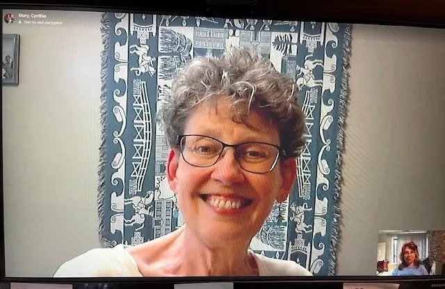 Smiling woman during a video call