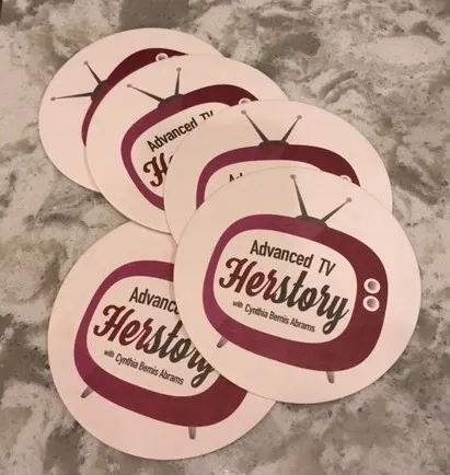 Vintage TV-themed coasters display