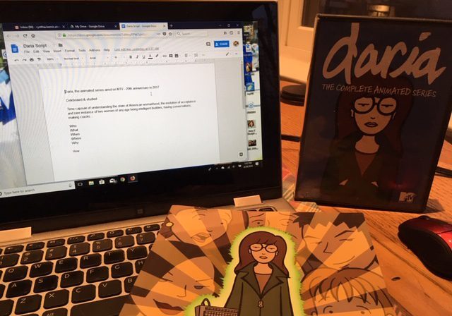 Open laptop with Daria DVD and artwork