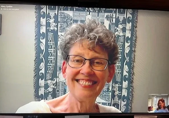 Smiling woman during a video call