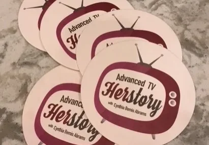 Vintage TV-themed coasters display